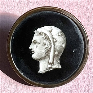 A 19th c. Liverpool transfer button of woman wearing a scarf of stars.