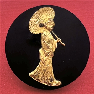 Extra large Vintage casein button with gilded escutcheon of a geisha.