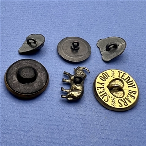 Six teddy bear and elephant buttons.