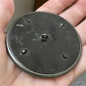 Huge celluloid tight top button with an Ivoroid center.