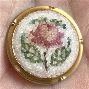 Pink rose coralene glass button.
