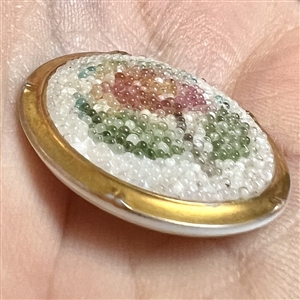 Pink rose coralene glass button.