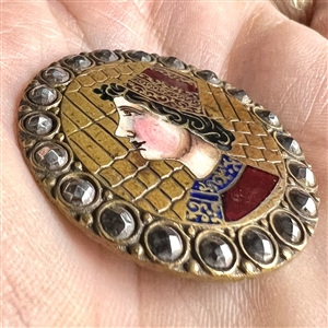 Champlevé enamel button of Renaissance man.