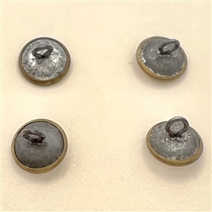 Four tiny tintype buttons of women.