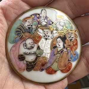 Extra large Japanese Kutani porcelain button of the seven Gods of Fortune.