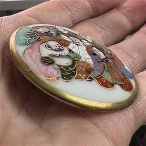 Extra large Japanese Kutani porcelain button of the seven Gods of Fortune.