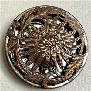 Highly sculptural brass button of a chrysanthemum.