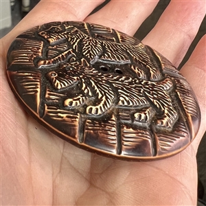 Extra large buffed celluloid button of scotty dogs.