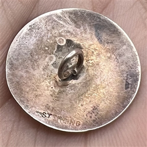 Sterling silver pinecone button.