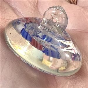 1939 Worlds Fair glass paperweight button of flowers.