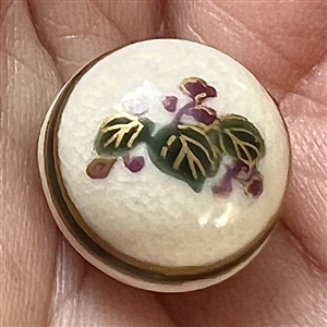 Satsuma ball button of berries and leaves.