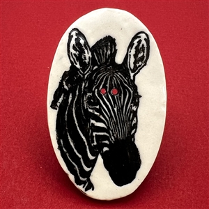 Ceramic studio button of a zebra by Diana M.B.