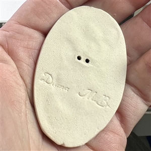 Ceramic studio button of a zebra by Diana M.B.