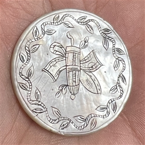 A 19th c. Pearl with incised and silvered French design.