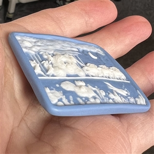 Jasperware studio button of Cinderella pumpkin carriage by Stella Rzanski.