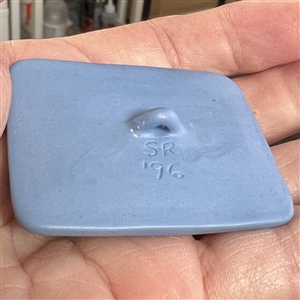 Jasperware studio button of Cinderella pumpkin carriage by Stella Rzanski.
