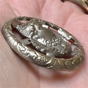 Silvered metal button of Mary Queen of Scots.