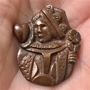 Realistic Queen of Hearts tinted copper button. 
