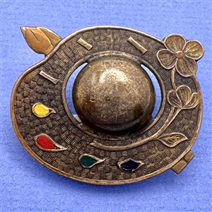 Brass button of realistic artist's pallet.
