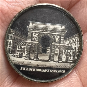 An 18th c. Paper under glass button of Porte St. Martin, Paris, France.