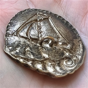 “Sailboat in a Shell” brass button.