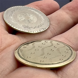 Two 18th c. chased and engraved Tombac buttons.