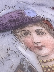 Painted porcelain button of a woman in feathered hat and shawl.