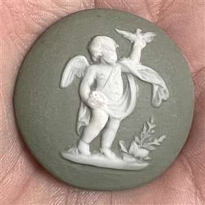 Studio Jasperware button of cherub with bird by Marie LaBarre Bennet