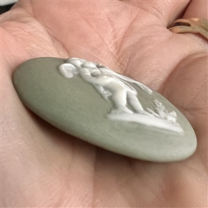 Studio Jasperware button of cherub with bird by Marie LaBarre Bennet
