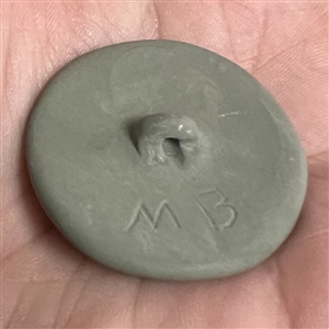 Studio Jasperware button of cherub with bird by Marie LaBarre Bennet