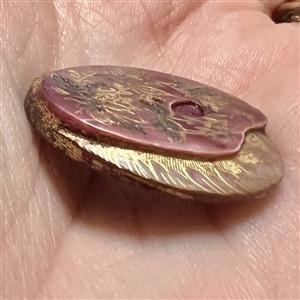 Beautiful dyed pearl button of artist’s pallet.