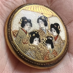 Japanese Satsuma button of group of Geiko women under an umbrella.