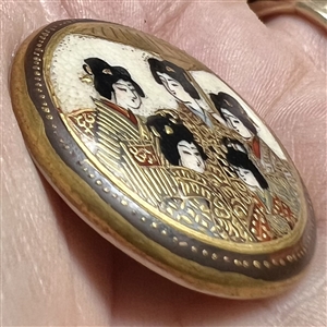 Japanese Satsuma button of group of Geiko women under an umbrella.