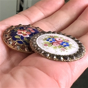 Two 19th c. enamel buttons of flowers with borders of cut-steels.