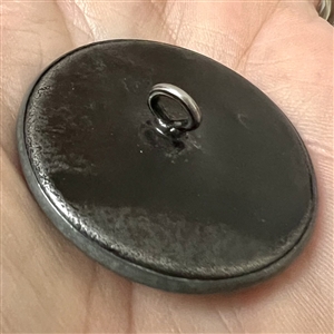 “Boating brass button of two boys playing with sailboat.