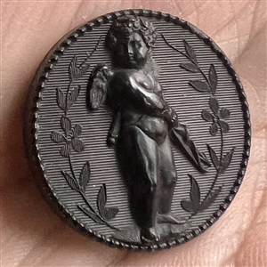 “Cupid taking aim horn button. 