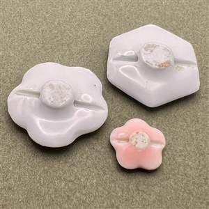 Three lovely Japanese Kutani porcelain  buttons in interesting shapes.