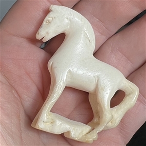 Extra large carved meerschaum button of a horse.