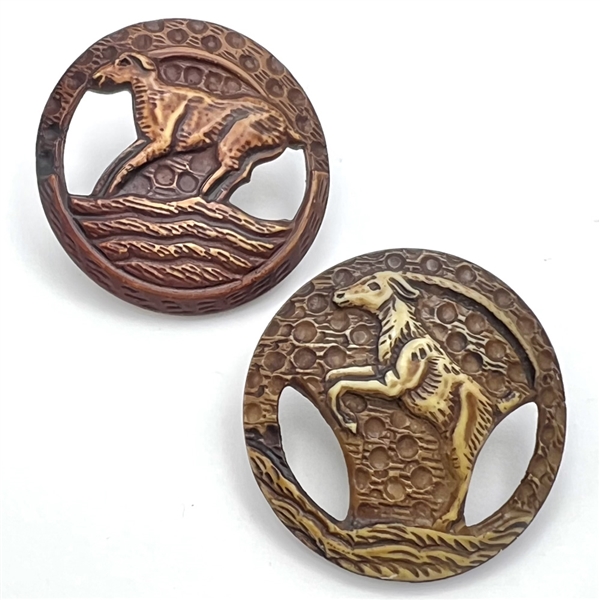 Two Vintage celluloid buttons of mountain goats.