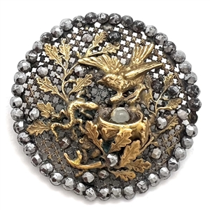A 19th c. screen back button of bird defending nest with egg from a lizard!