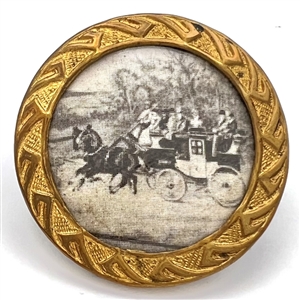 Printed paper under celluloid of a horse and carriage. 