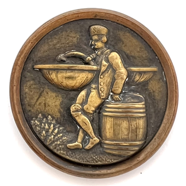 SCARCE “Fish Peddler Boy" brass button.