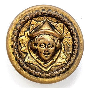 Brass “Simple Simon" nursery rhyme button. 
