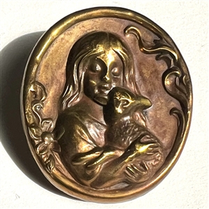 Brass “Mary and her Lamb" nursery rhyme button. 