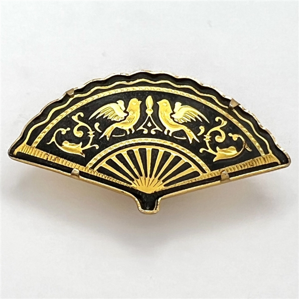 Damascene button of realistic fan. 