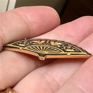 Damascene button of realistic fan. 