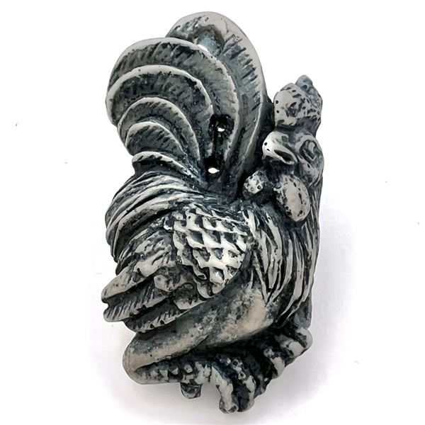 Sew thru realistic rooster button. 
