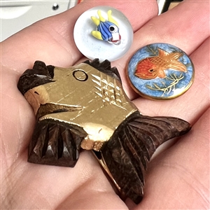 Three buttons of fish.