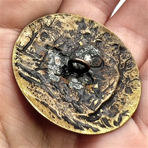 “Tally Ho brass button.