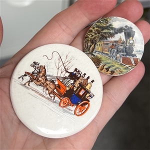 Two studio ceramic buttons of transportation. 